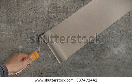 flatting and putting stucco gray concrete slab, horizontal photo