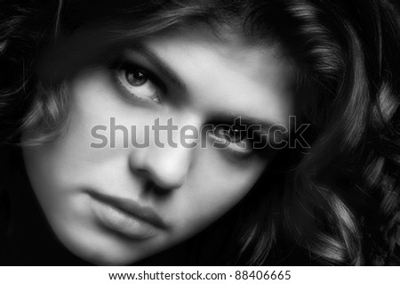 the very  pretty  young woman,  sensual look , gray-scale horizontal  closeup portrait