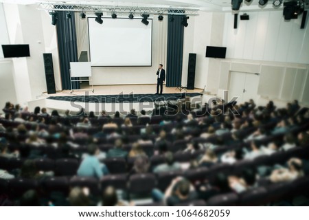 Speaker at Business Conference and Presentation. Audience the conference hall.