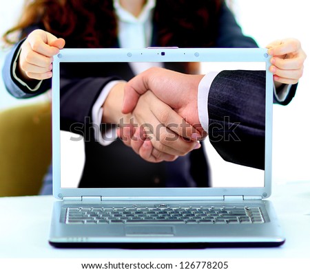 Businesswoman with tablet computer in her hand,Hand shake
