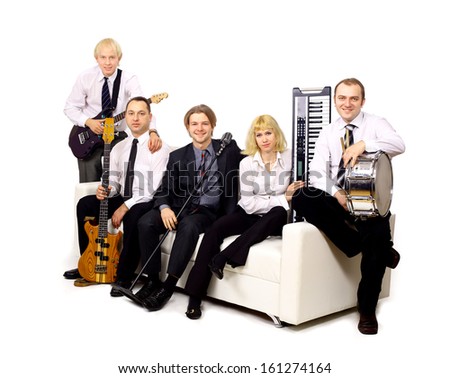Groups of musicians sit on the white couch. Isolated on white background