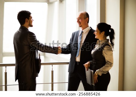 image of a business team discussing the latest financial results