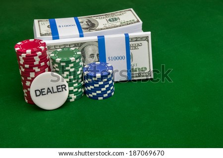 Stack of cash with poker chips