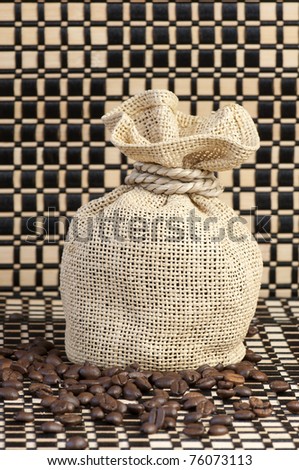 Canvas bag filled with roasted coffee beans