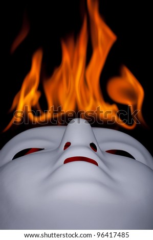 White mask on fire