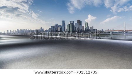 Panoramic skyline and buildings with empty road chongqing city china
