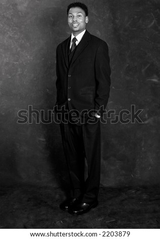 Retro style black & white shot of an African American man in a business suit