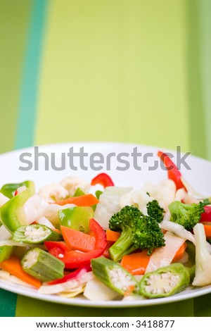 Vegetable salad greens made from broccoli, okra, cauliflower, red pepper lettuce and carrots.