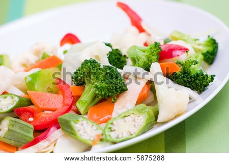 Vegetable salad greens made from broccoli, okra, cauliflower, red pepper lettuce and carrots.