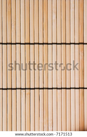 Picture of a bamboo or a straw textured background. Very rustic looking.