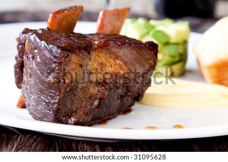 Short rib, cooked to perfection, served with savoury pound cake, avocado cubes, turnip puree and county cider reduction.