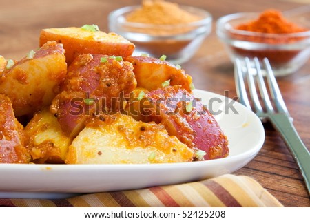 Potatoes cooked in a variety of Indian spices and pastes