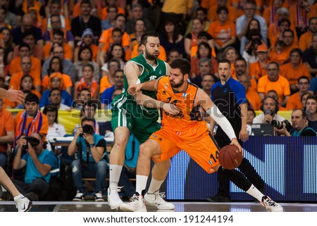 VALENCIA - MAY, 1: one-on-one with Doubljevic #14 and Vougioukas during a Eurocup Finals match between Valencia Basket Club and Unics Kazan at the Fonteta Stadium on May 1, 2014 in Valencia, Spain