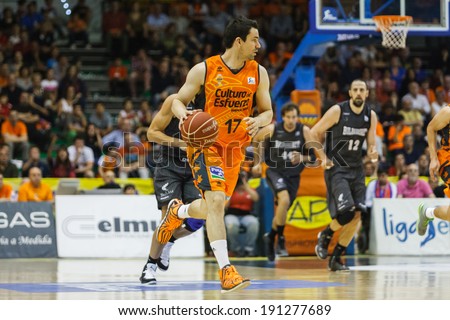 VALENCIA - MAY, 3: Martinez drives the ball during a Spanish league match between Valencia Basket Club and Bilbao at the Fonteta Stadium on May 3, 2014 in Valencia, Spain