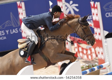 VALENCIA, SPAIN - MAY 7: Rider Bono Rodriguez, Horse Ramona, Spain in the Global Champions Tour Valencia 2010 equestrian - the City of Arts and Sciences of Valencia, Spain on May 7, 2010