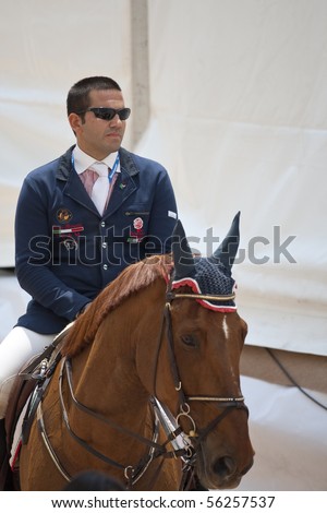 VALENCIA, SPAIN - MAY 7: Rider Guido Grimaldi, Horse Art Nouveau, Italy in the Global Champions Tour Valencia 2010 equestrian - the City of Arts and Sciences of Valencia, Spain on May 7, 2010