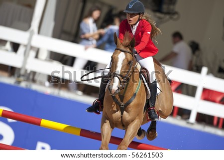 VALENCIA, SPAIN - MAY 8: Rider Munyoz, Horse Major de Piquet, Spain in the Global Champions Tour Valencia 2010 equestrian - the City of Arts and Sciences of Valencia, Spain on May 8, 2010