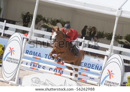 VALENCIA, SPAIN - MAY 8: Rider Riva, Horse Racing, Spain in the Global Champions Tour Valencia 2010 equestrian - the City of Arts and Sciences of Valencia, Spain on May 8, 2010