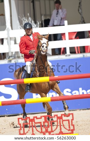 VALENCIA, SPAIN - MAY 8: Rider Riva, Horse Racing, Spain in the Global Champions Tour Valencia 2010 equestrian - the City of Arts and Sciences of Valencia, Spain on May 8, 2010