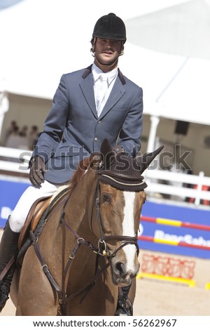 VALENCIA, SPAIN - MAY 8: Rider Bono Rodriguez, Horse Navaros, Spain in the Global Champions Tour Valencia 2010 equestrian - the City of Arts and Sciences of Valencia, Spain on May 8, 2010