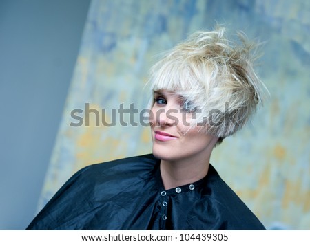 woman with messy hair in salon