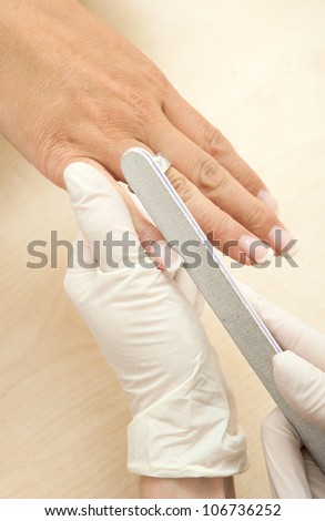 preparing nails for french manicure treatment