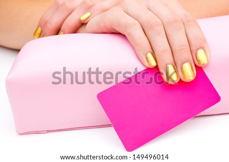 woman manicured hand with blank business card for beauty salon