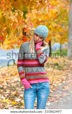 sad attractive teen girl outside walking