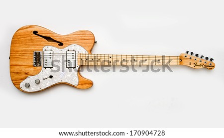 ZAGREB , CROATIA - JUN 10, 2010 : old vintage wooden Fender telecaster guitar on white background , product shot
