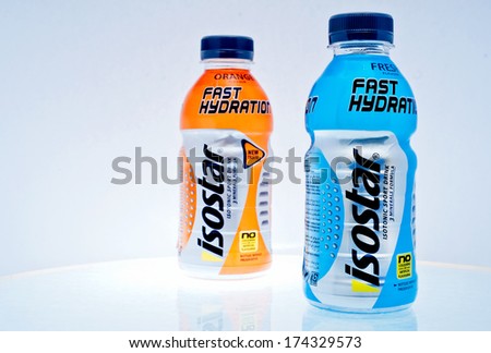 ZAGREB , CROATIA - FEBRUARY 1 ,2014 :  bottles of isotonic sport drink Isostar on the table