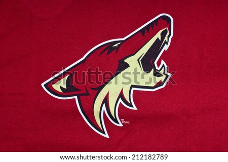 ZAGREB , CROATIA - AUGUST 19 , 2014 :  NHL Phoenix Arizona Coyotes club logo printed on textile equipment ,product shot