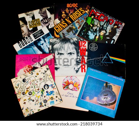 ZAGREB , CROATIA - SEPTEMBER 17 , 2014 - various old vinyl LP records on black background, product shot