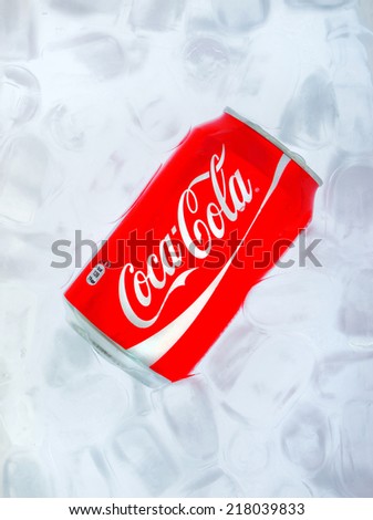 ZAGREB , CROATIA - SEPTEMBER 17. 2014 -  Coca Cola can in the ice water, refreshing drink , product shot