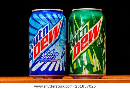ZAGREB , CROATIA - NOVEMBER 19 ,2014 :   Mountain Dew can splashed with water on black background, product shot