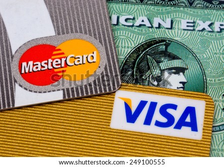 ZAGREB , CROATIA - 02 FEBRUARY 2015 - close up of pile credit cards with master card, VISA and american express logo on the credit card , product shot