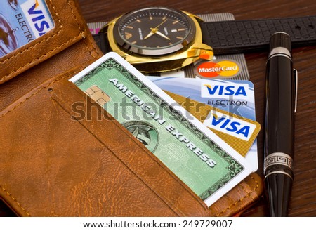 ZAGREB , CROATIA - 02 FEBRUARY 2015 - close up of credit cards , master card, VISA and american express in the leather wallet , product shot