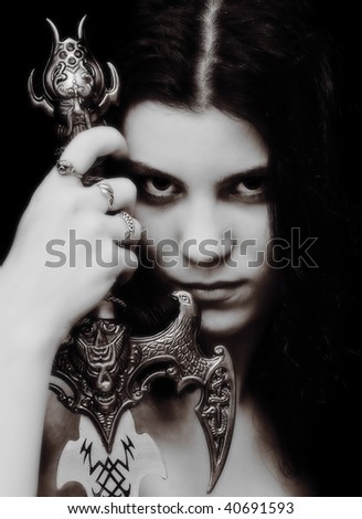 fantasy image of gothic girl holding the sword