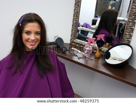 woman in hair salon with wet hair