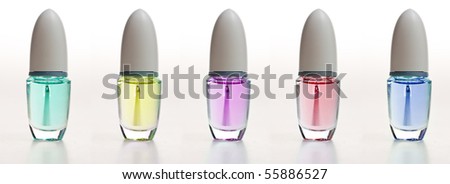 small cosmetic bottles in different colors