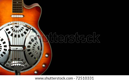 dobro slide guitar detail on black background