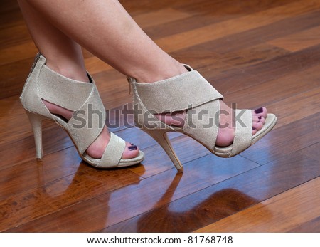 woman feet in high heels summer sandals shoes
