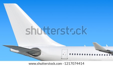 Modern passenger jet aircraft side tail silhouette with aircraft parts wing winglet passenger window aft exit stabilizer fin antenna jet engine exhaust design air travel isolated on sky white scheme
