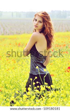 redhead  pretty girl in field -  vintage style