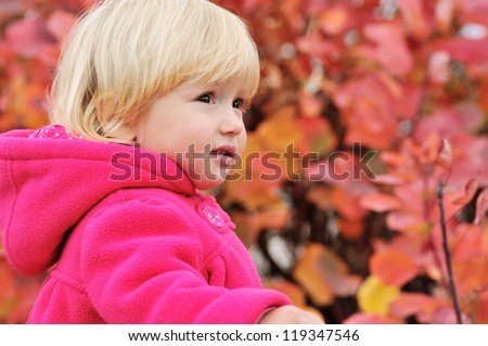 sweet toddler girl looking ahead