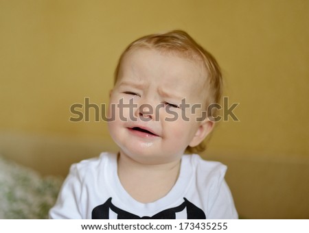 crying baby with sad face