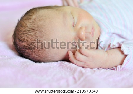 sweet dreams of newborn in soft focus