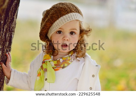 cute baby girl in fall time