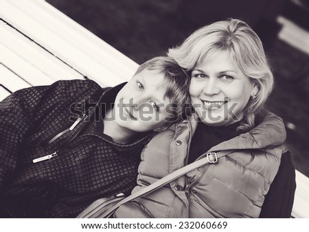 middle age woman and son outdoors