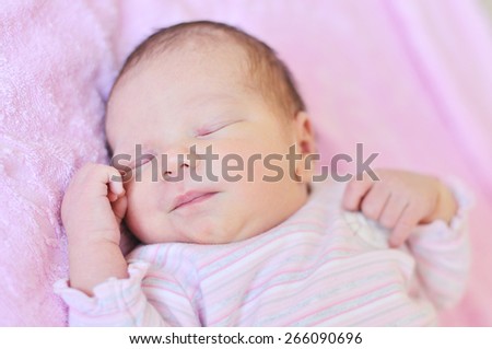 sweet dreams of newborn girl in soft  selective focus