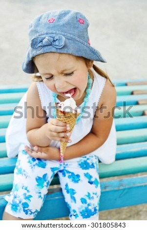 happy child with big ice cream cone